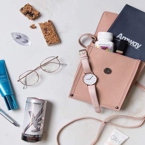 Flat lay of Amway products that support the young mom/Amway Business Owner lifestyle. Asset may be used across brands.