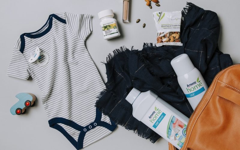 Flat lay of Amway products that support a new mom/dad lifestyle. Asset may be used across brands.